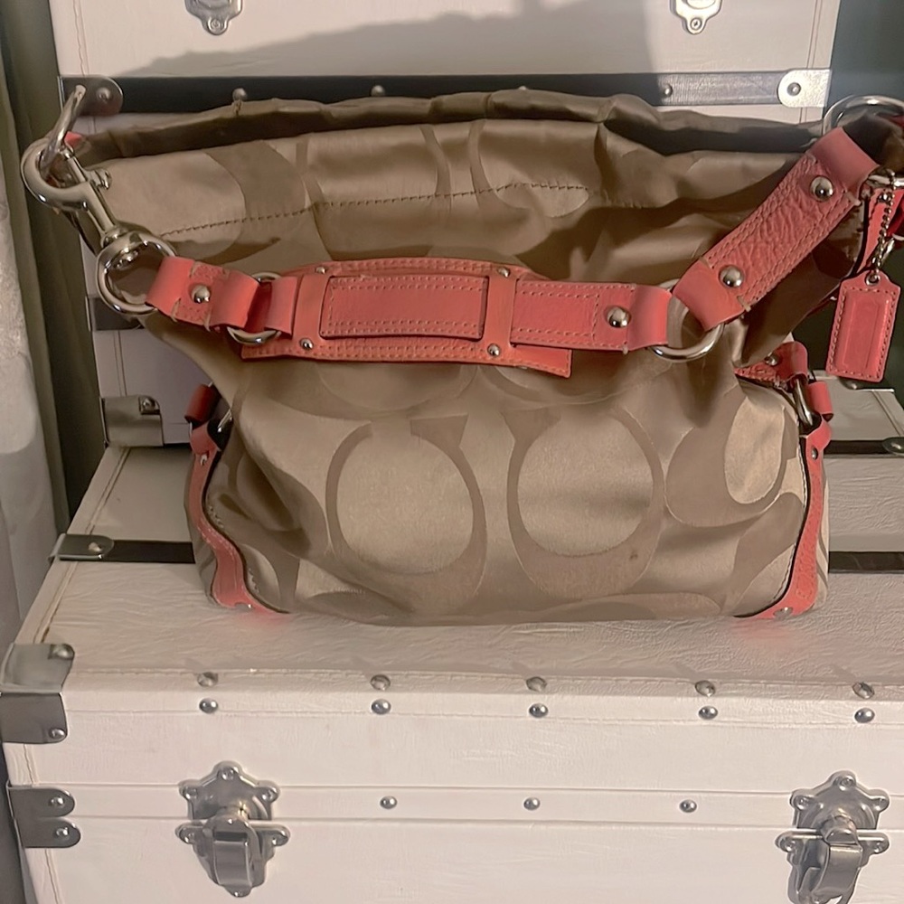 Beautiful Coach purse that can complement most outfits.